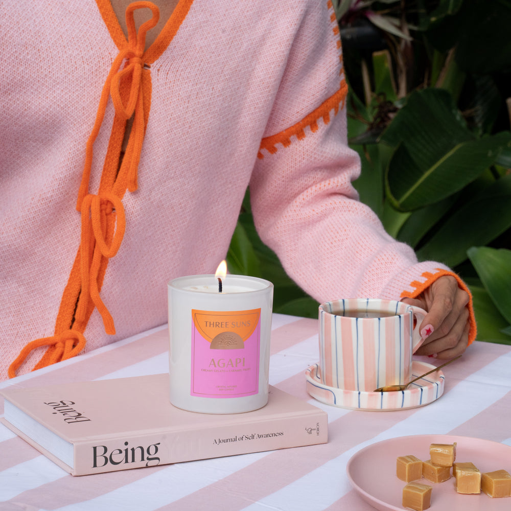 
                      
                        Three Suns Agapi Large Candle, hand-poured soy wax infused with Rose Quartz and Clear Quartz crystals for love and calm, premium eco-friendly candle Australia.
                      
                    